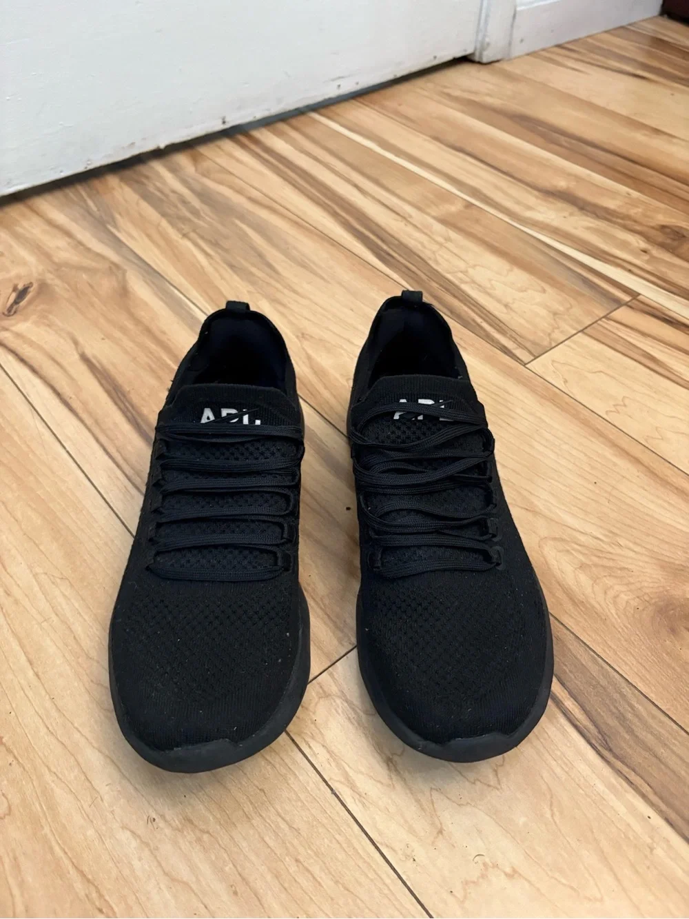 APL all black sneakers